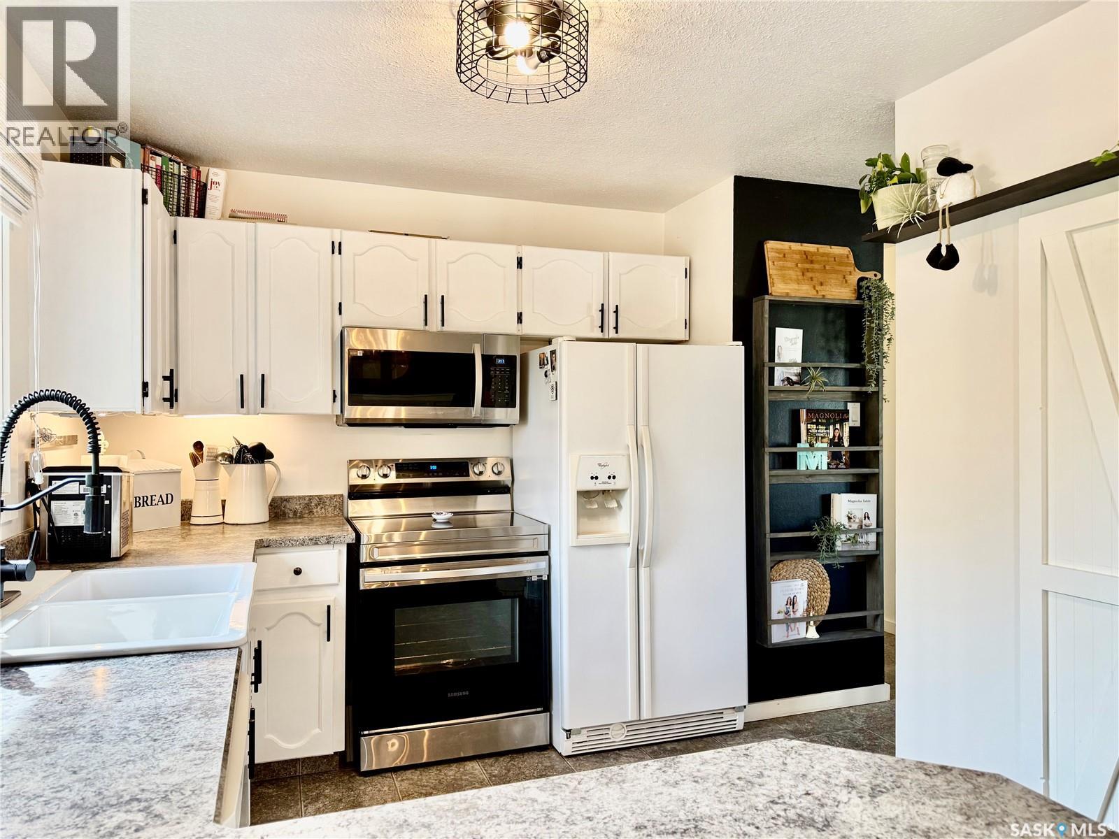 38 Howard Crescent, Lanigan, Saskatchewan  S0K 2M0 - Photo 19 - SK021225