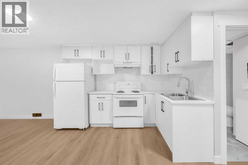 325 Woodvale Crescent Sw, Calgary, Alberta  T3W 3L3 - Photo 11 - A2260226