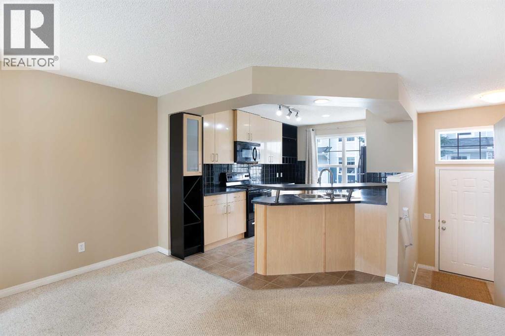 3050 New Brighton Gardens Se, Calgary, Alberta T2Z 0A5 - Photo 4 - A2212858