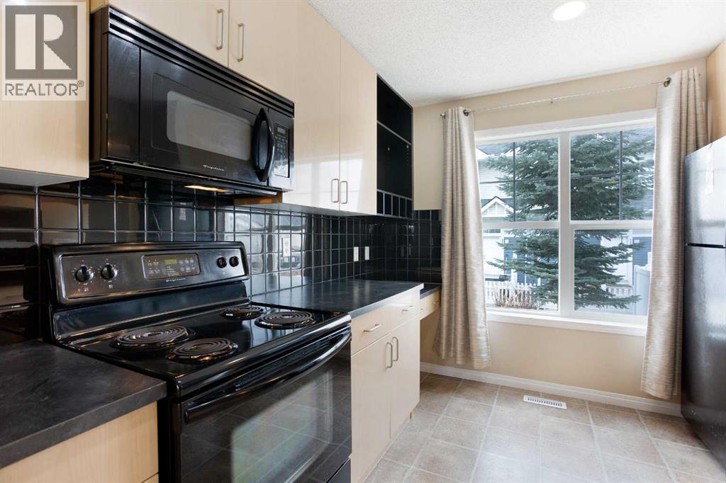 3050 New Brighton Gardens Se, Calgary, Alberta T2Z 0A5 - Photo 7 - A2212858