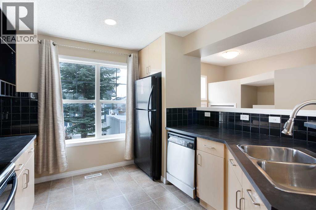 3050 New Brighton Gardens Se, Calgary, Alberta T2Z 0A5 - Photo 8 - A2212858