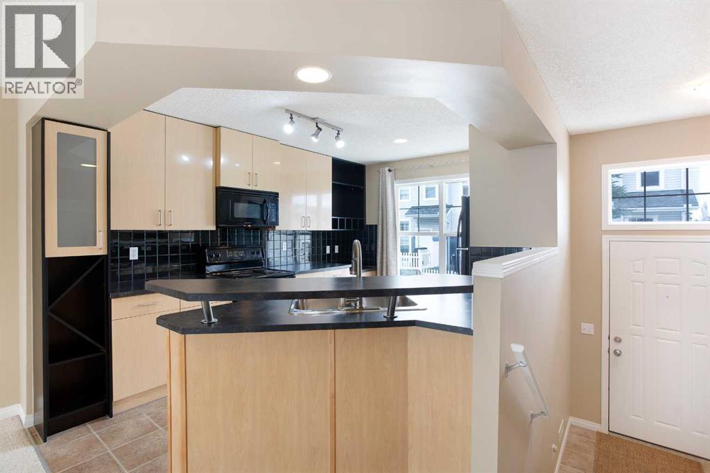 3050 New Brighton Gardens Se, Calgary, Alberta T2Z 0A5 - Photo 6 - A2212858