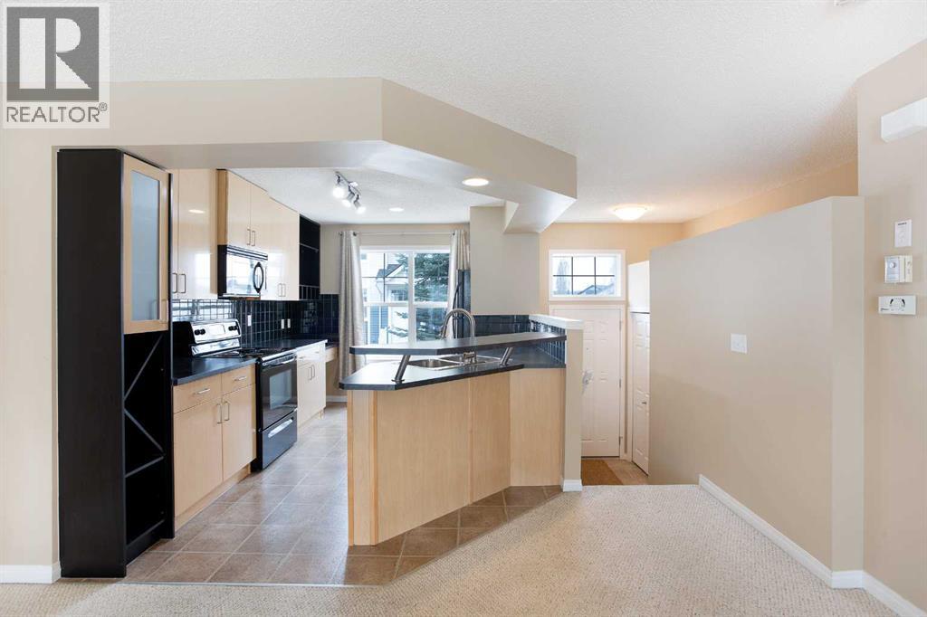 3050 New Brighton Gardens Se, Calgary, Alberta T2Z 0A5 - Photo 5 - A2212858