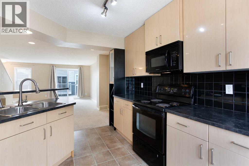 3050 New Brighton Gardens Se, Calgary, Alberta T2Z 0A5 - Photo 9 - A2212858