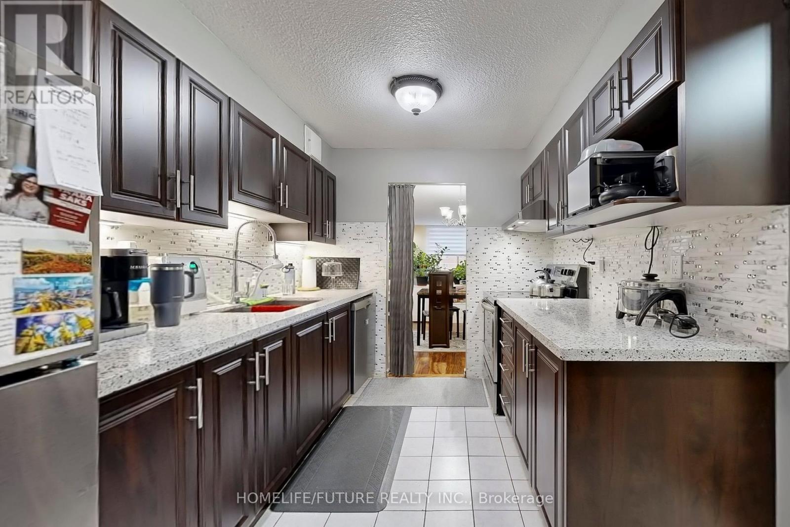 409 - 10 Tobermory Drive, Toronto (Black Creek), Ontario  M3N 2Y5 - Photo 31 - W12472861