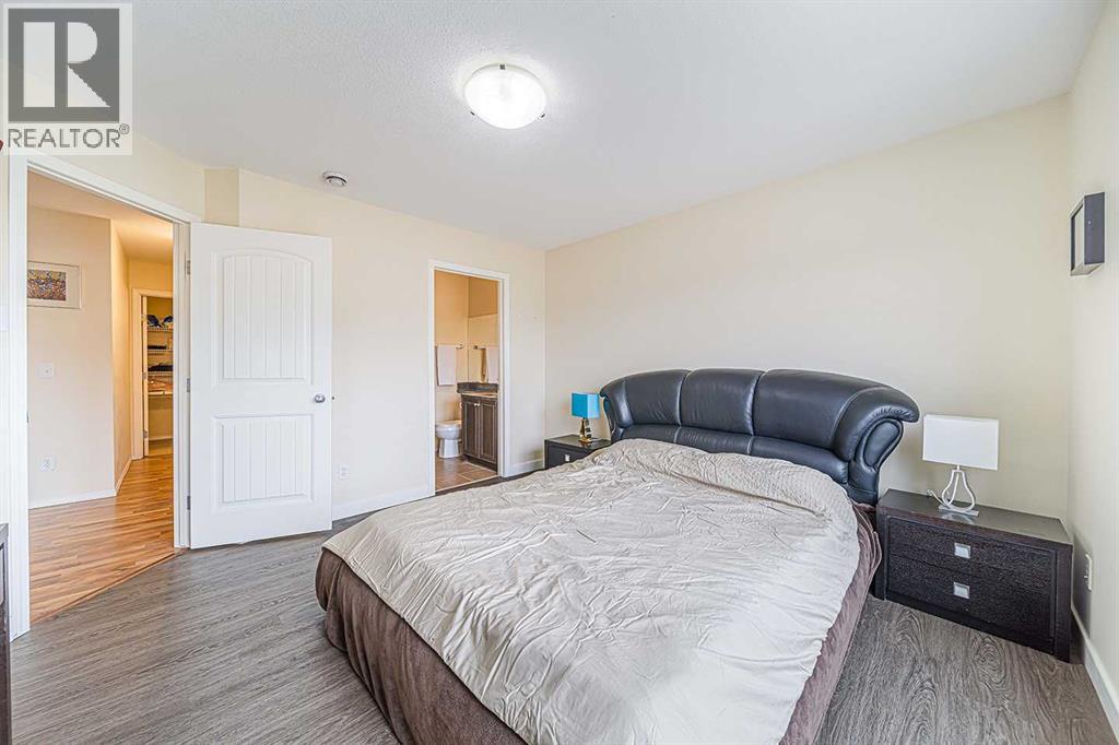 202, 31 Panatella Landing Nw, Calgary, Alberta  T3K 0J7 - Photo 12 - A2259603