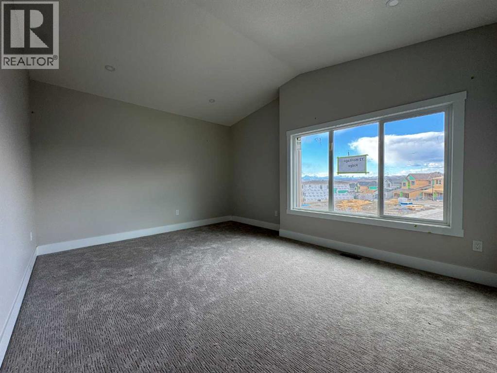 72 Heritage Ridge, Cochrane, Alberta  T4C 2J8 - Photo 18 - A2256304