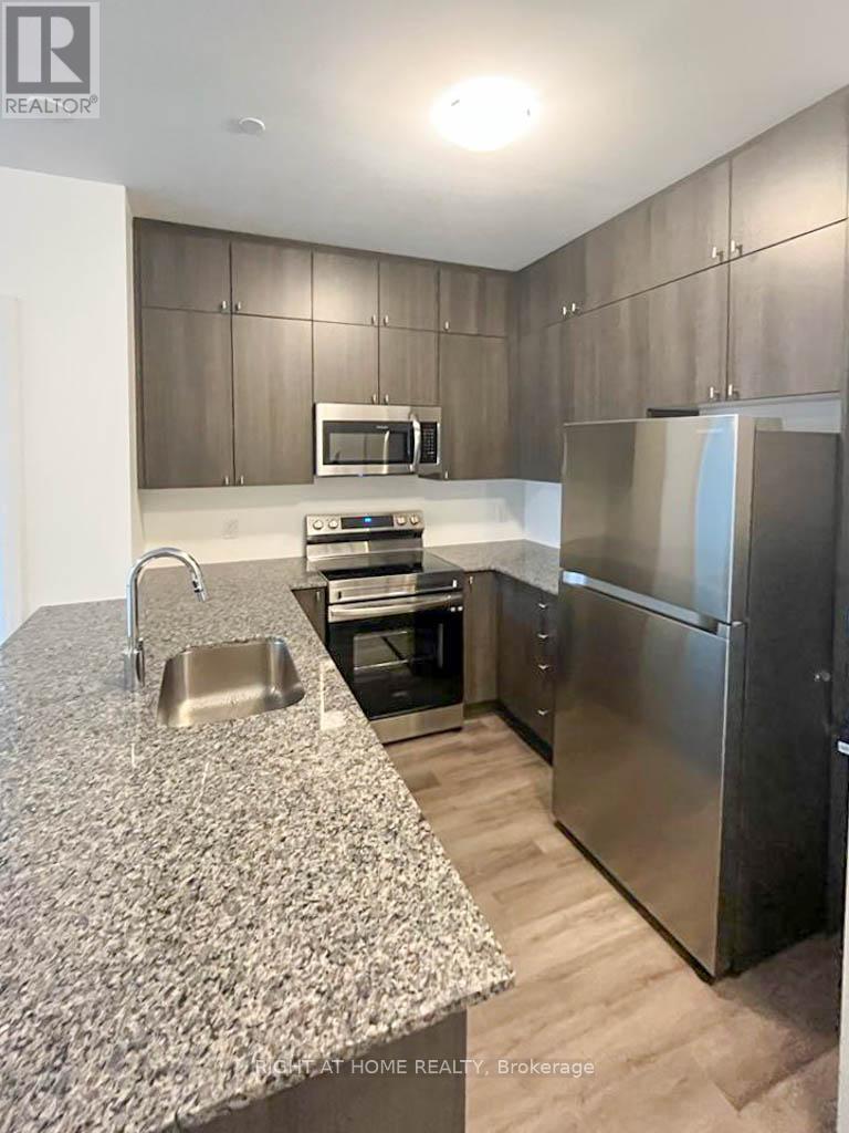 411 - 460 Gordon Krantz Avenue, Milton, Ontario  L9E 1Z2 - Photo 5 - W12472934