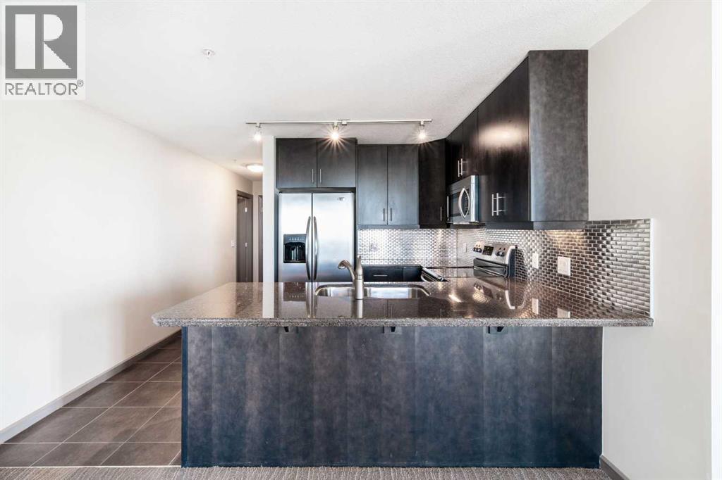 2010, 210 15 Avenue Se, Calgary, Alberta  T2B 0B5 - Photo 3 - A2265418