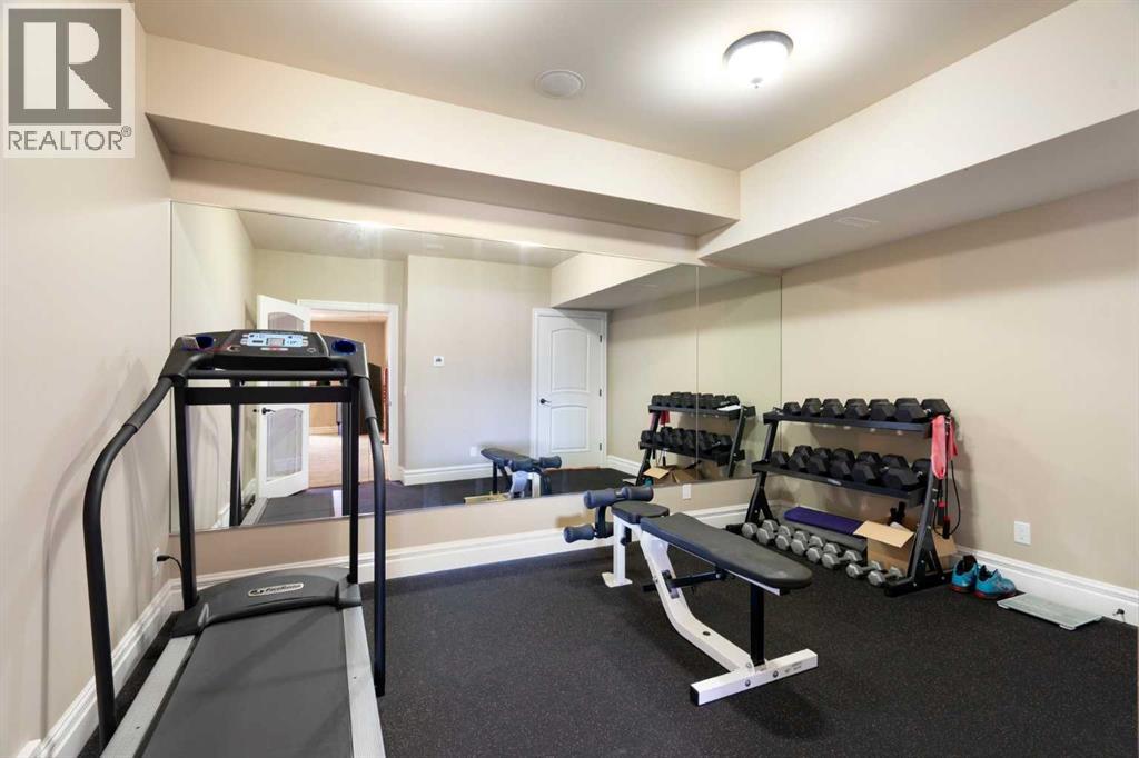 124 Grizzly Rise, Rural Rocky View County, Alberta  T4C 0B5 - Photo 28 - A2211387