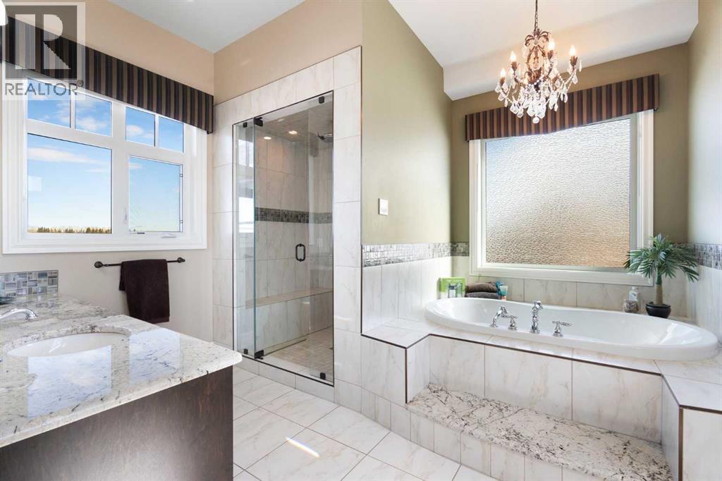 124 Grizzly Rise, Rural Rocky View County, Alberta  T4C 0B5 - Photo 20 - A2211387