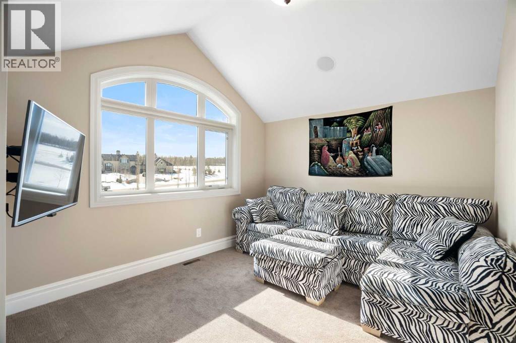 124 Grizzly Rise, Rural Rocky View County, Alberta  T4C 0B5 - Photo 38 - A2211387