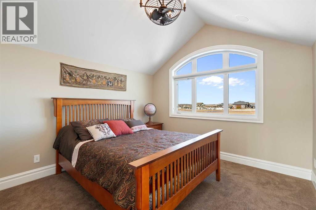 124 Grizzly Rise, Rural Rocky View County, Alberta  T4C 0B5 - Photo 39 - A2211387