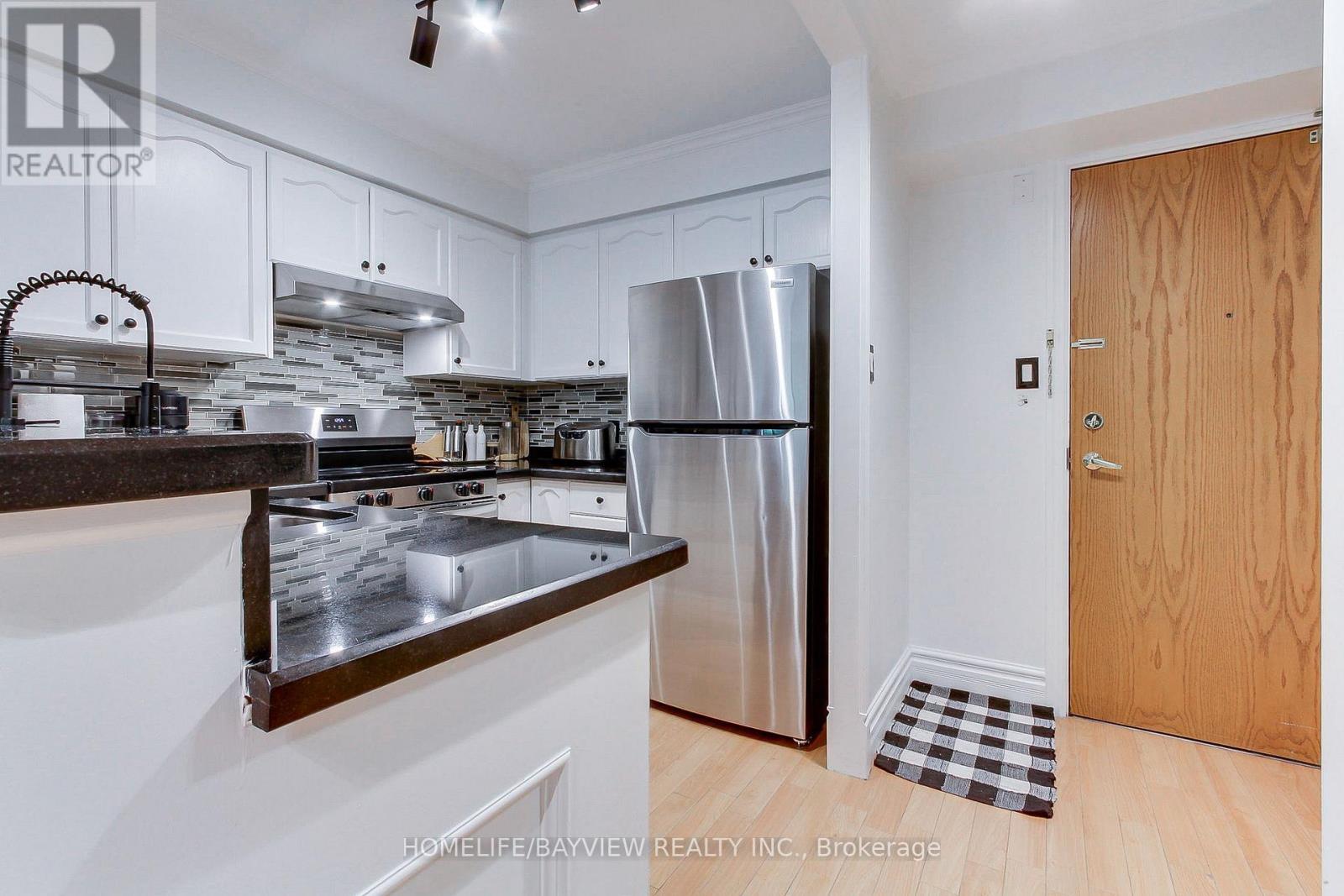 110 - 245 Pine Grove Road, Vaughan, Ontario  L4L 2H7 - Photo 4 - N12473160