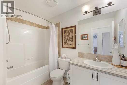 204 Paint Horse Drive, Cochrane, Alberta  T4C 0X1 - Photo 25 - A2261599