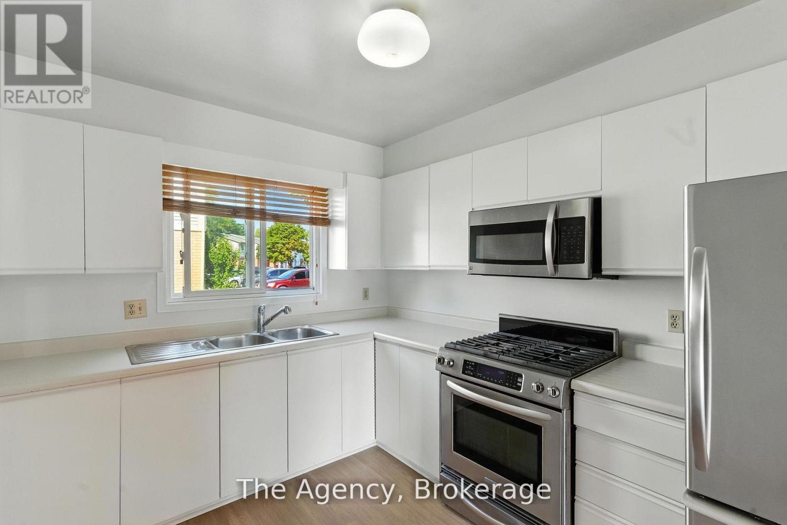 44 - 65 Dorchester Boulevard, St. Catharines, Ontario  L2M 7T7 - Photo 7 - X12473449