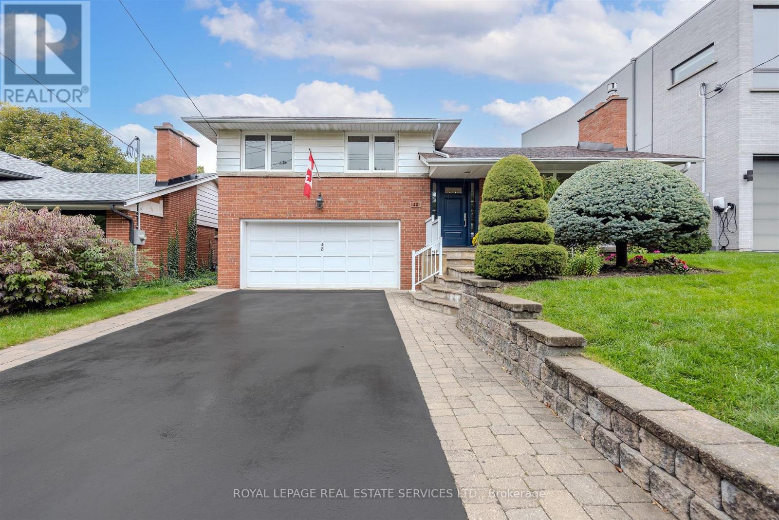 48 Reid Manor, Toronto, Ontario  M8Y 2J1 - Photo 2 - W12473380