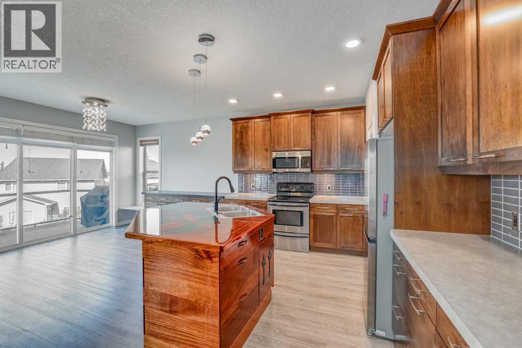 129 Pantego Bay Nw, Calgary, Alberta  T3K 0B7 - Photo 5 - A2255406