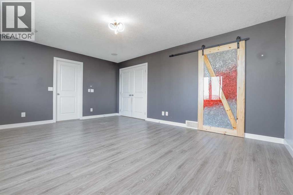 129 Pantego Bay Nw, Calgary, Alberta  T3K 0B7 - Photo 19 - A2255406