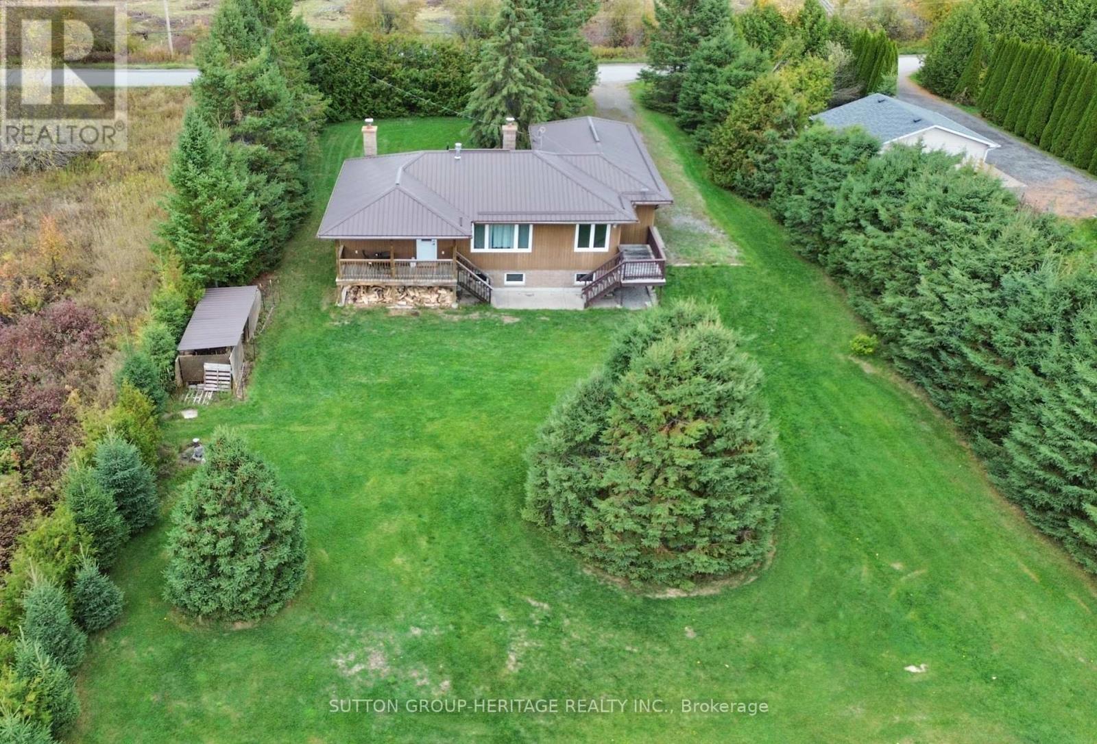 584 Rohallion Road S, Kawartha Lakes (Carden), Ontario  L0K 1B0 - Photo 1 - X12473268