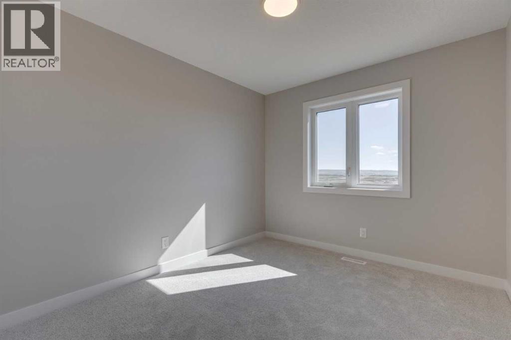 99 Southborough Crescent, Cochrane, Alberta  T4C 2S6 - Photo 20 - A2262263