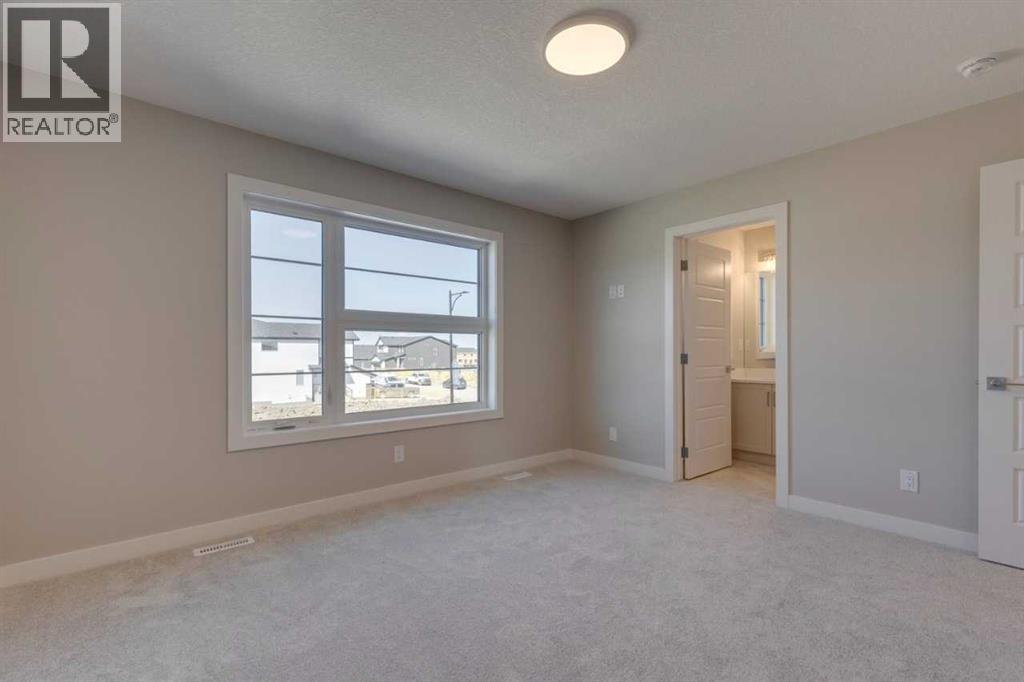 99 Southborough Crescent, Cochrane, Alberta  T4C 2S6 - Photo 5 - A2262263