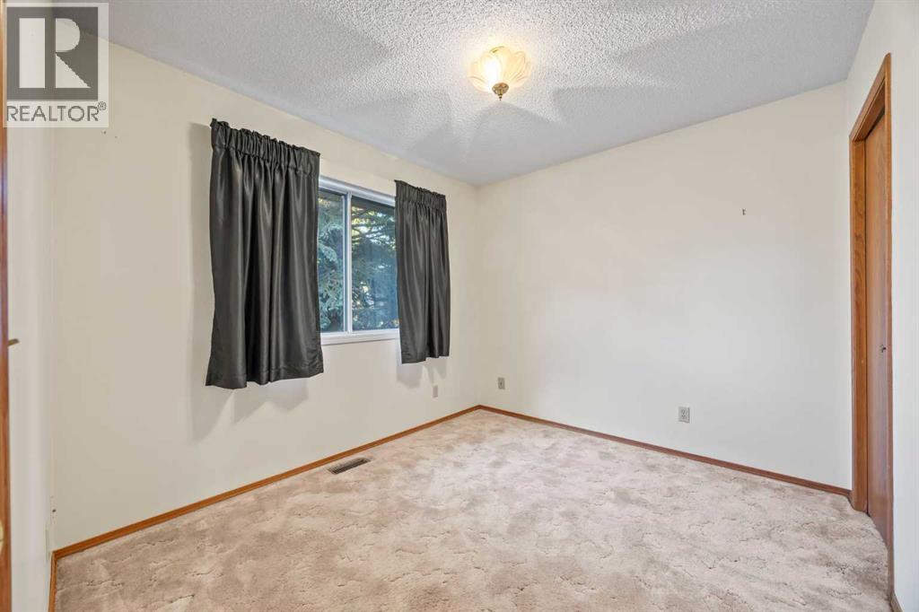 52 Sandarac Circle Nw, Calgary, Alberta  T3K 3V6 - Photo 17 - A2263600