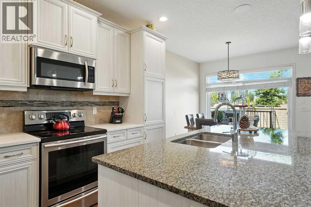 57 Evansglen Mews Nw, Calgary, Alberta  T3P 0P1 - Photo 6 - A2248527