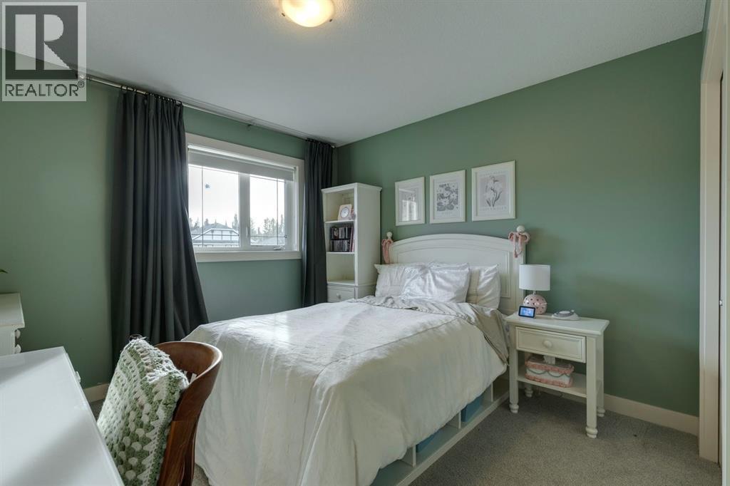 60 Elmont Court Sw, Calgary, Alberta  T3H 5Z8 - Photo 30 - A2261372