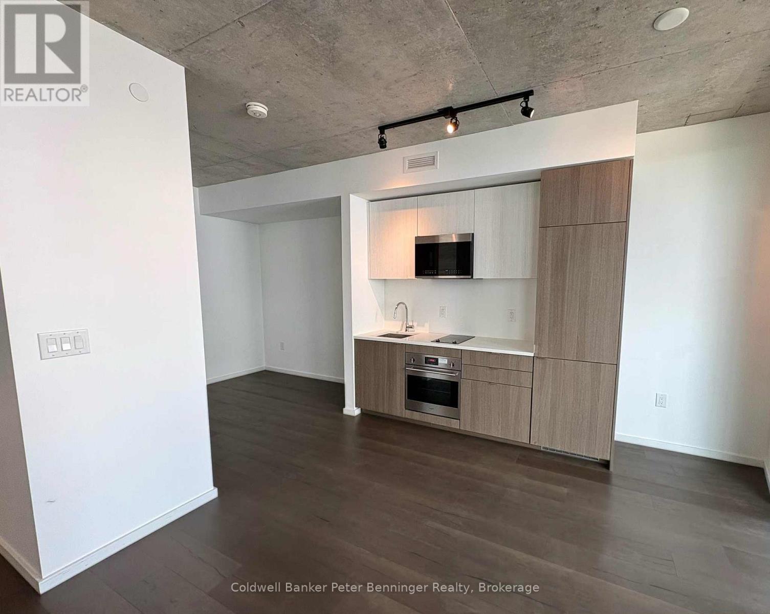 514 - 21 Lawren Harris Square, Toronto, Ontario  M5A 0T4 - Photo 1 - C12473976