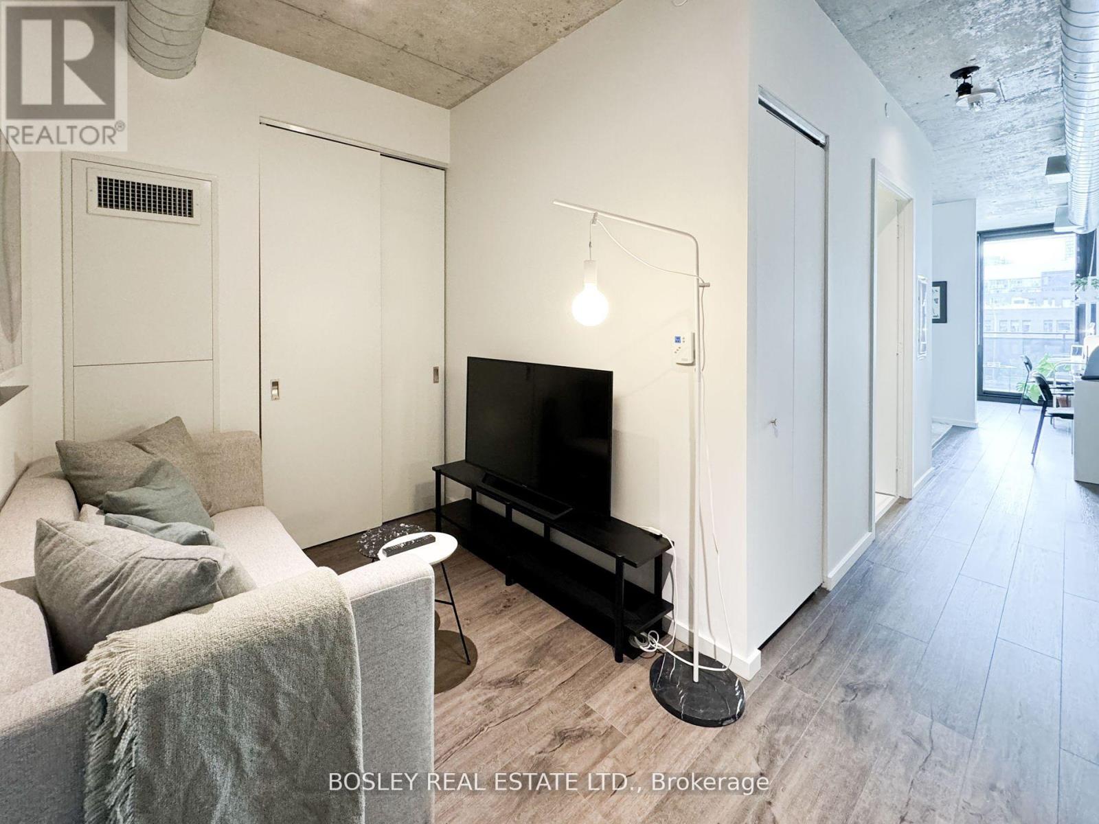 410 - 21 Lawren Harris Street, Toronto, Ontario  M5A 1T4 - Photo 3 - C12473933
