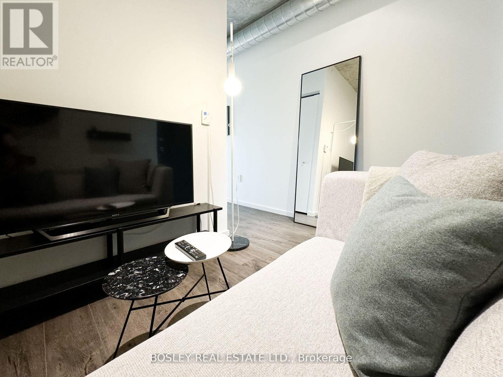 410 - 21 Lawren Harris Street, Toronto, Ontario  M5A 1T4 - Photo 4 - C12473933