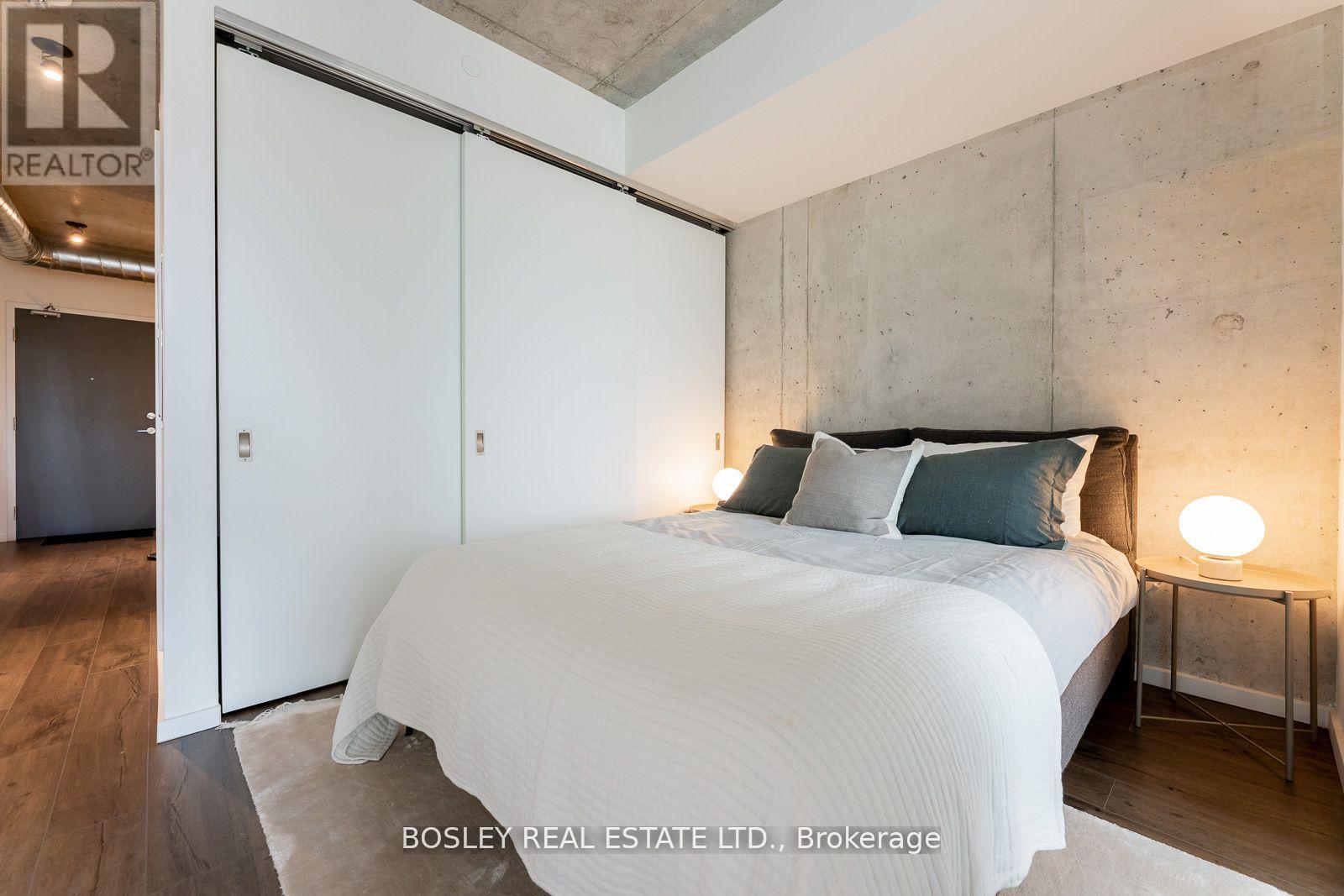 410 - 21 Lawren Harris Street, Toronto, Ontario  M5A 1T4 - Photo 9 - C12473933