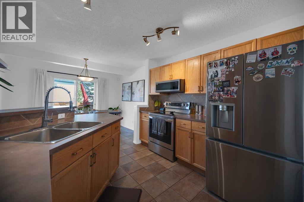 154 Bridlewood Court Sw, Calgary, Alberta  T2Y 3Z1 - Photo 8 - A2260167