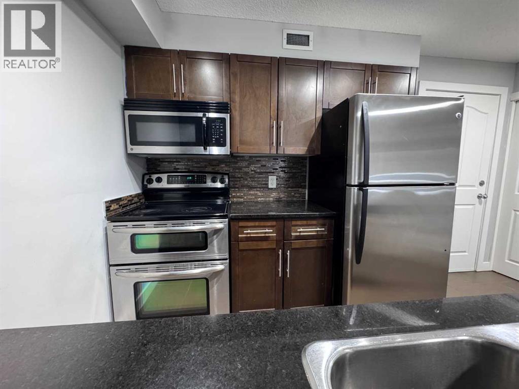 107, 7110 80 Avenue Ne, Calgary, Alberta  T3J 0N4 - Photo 3 - A2257393