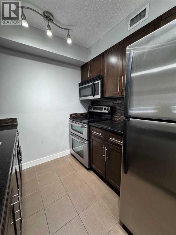 107, 7110 80 Avenue Ne, Calgary, Alberta  T3J 0N4 - Photo 4 - A2257393