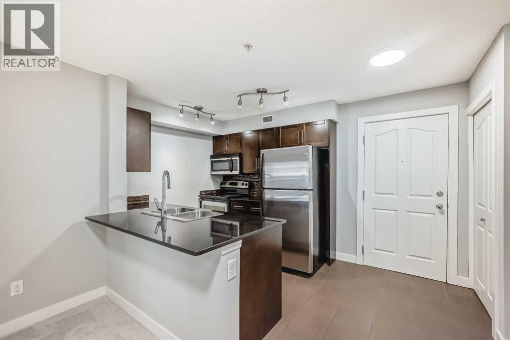 107, 7110 80 Avenue Ne, Calgary, Alberta  T3J 0N4 - Photo 1 - A2257393