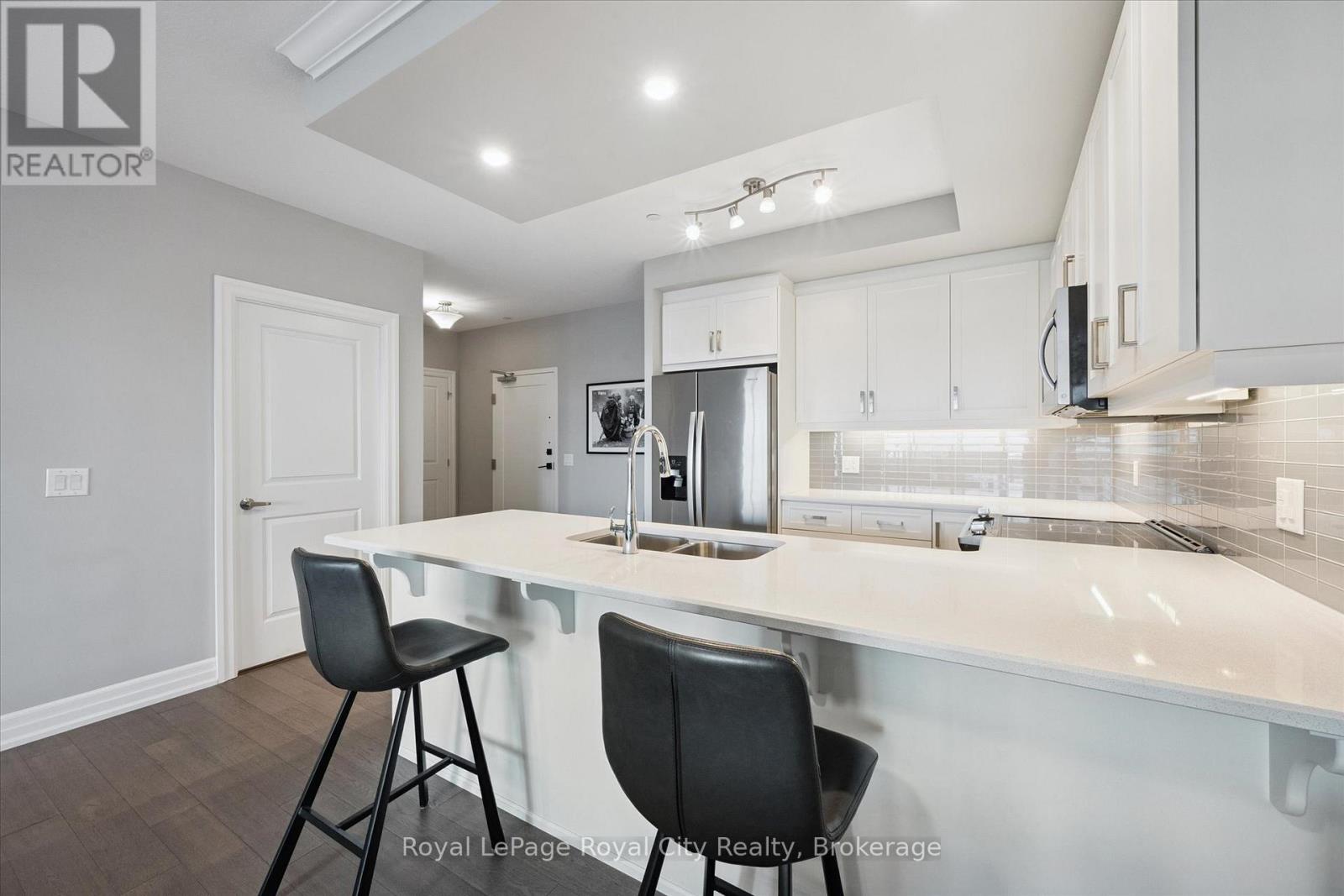 409 - 1878 Gordon Street, Guelph, Ontario  N1L 0P4 - Photo 2 - X12474267
