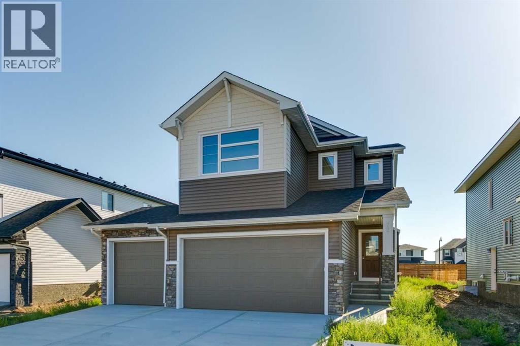 72 Dawson Wharf Mount, Chestermere, Alberta  T1X 2X6 - Photo 1 - A2262127