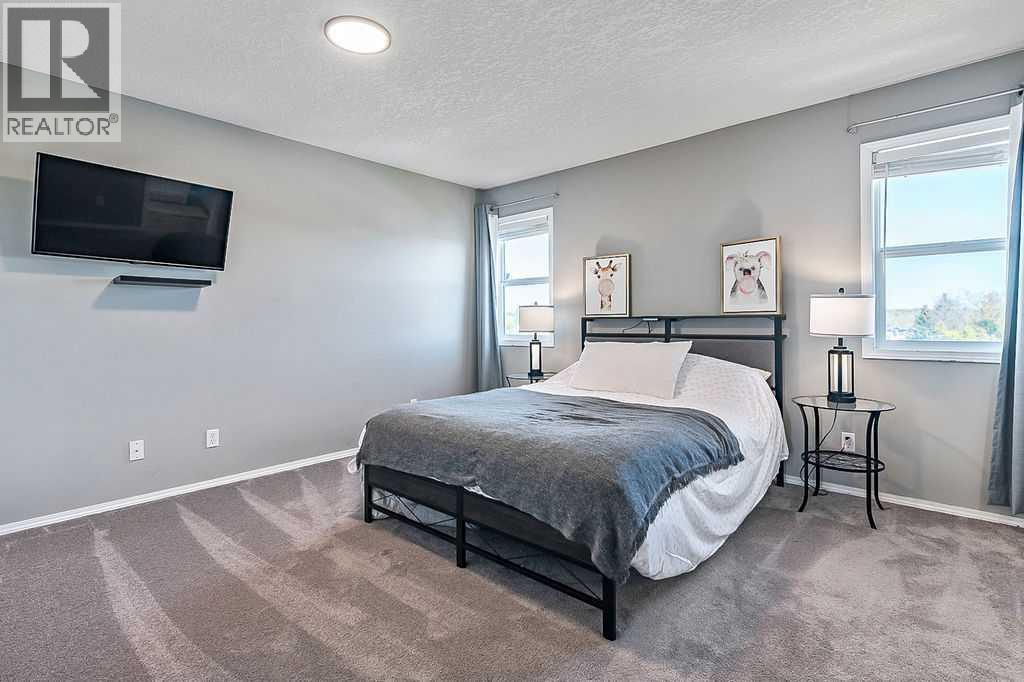 125 Cimarron Rise, Okotoks, Alberta  T1S 1M7 - Photo 25 - A2264021