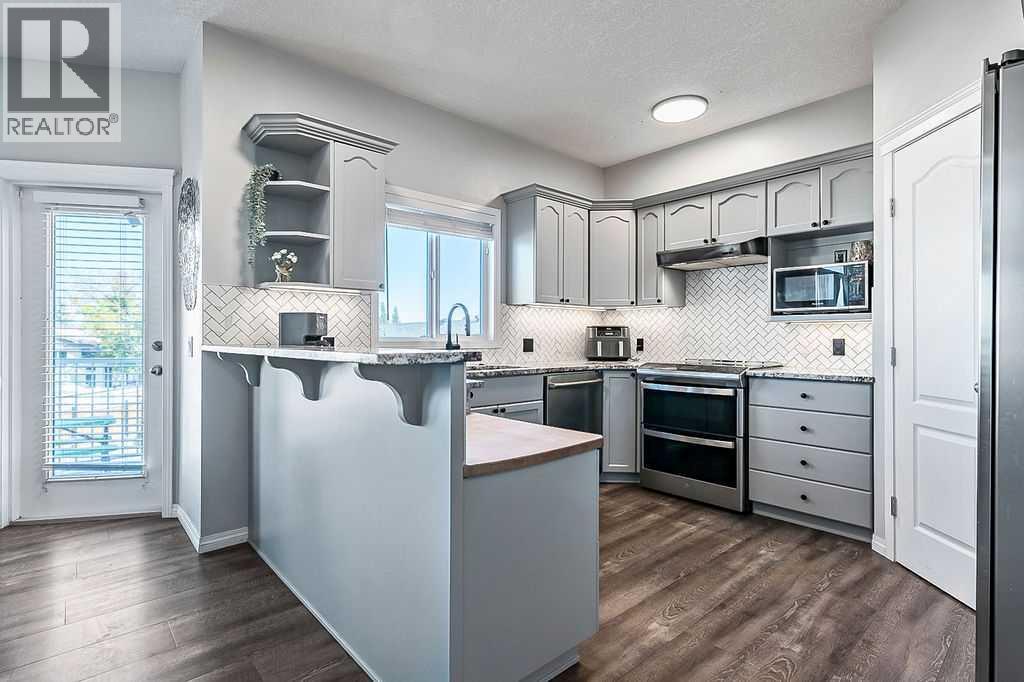 125 Cimarron Rise, Okotoks, Alberta  T1S 1M7 - Photo 12 - A2264021