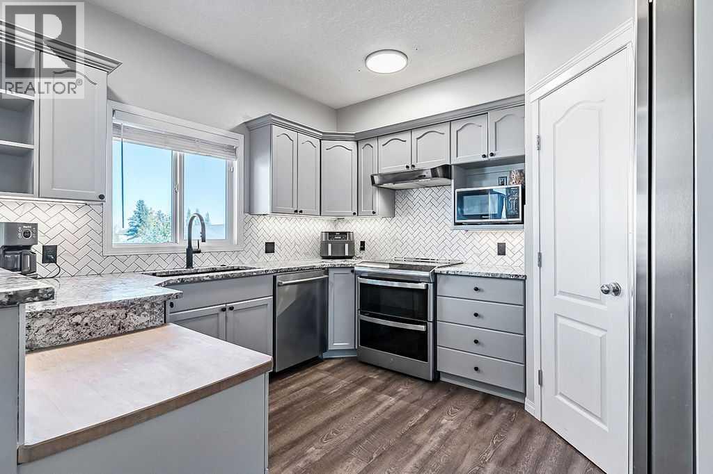 125 Cimarron Rise, Okotoks, Alberta  T1S 1M7 - Photo 6 - A2264021