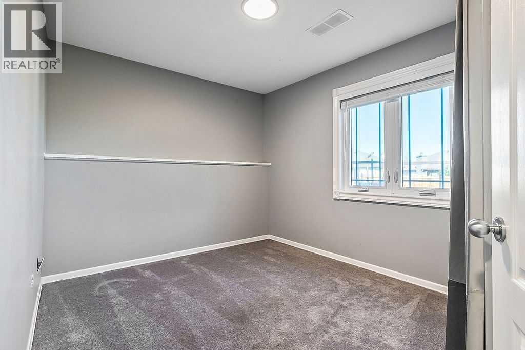 125 Cimarron Rise, Okotoks, Alberta  T1S 1M7 - Photo 30 - A2264021