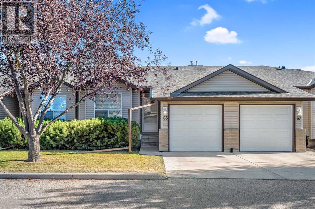 65 Tararidge Circle Ne, Calgary, Alberta  T3J 3W4 - Photo 3 - A2265952