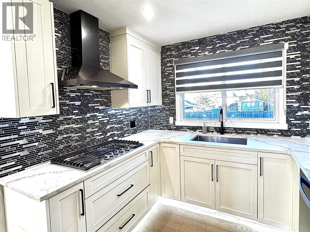 10304 Elbow Drive Sw, Calgary, Alberta  T2W 1G1 - Photo 2 - A2260098