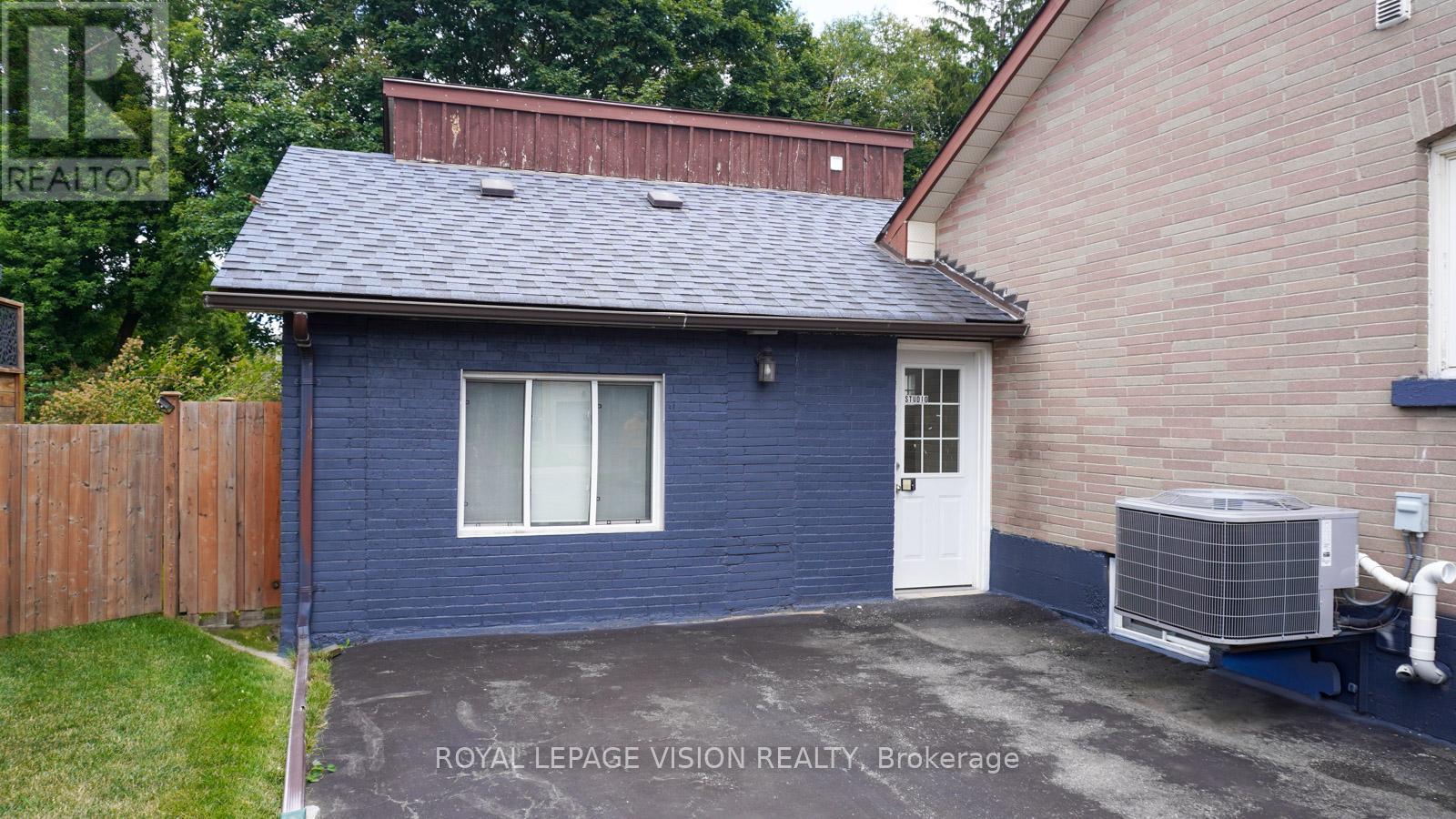 Coach House - 117 William Street, Whitchurch-Stouffville, Ontario  L4A 1B3 - Photo 1 - N12474440