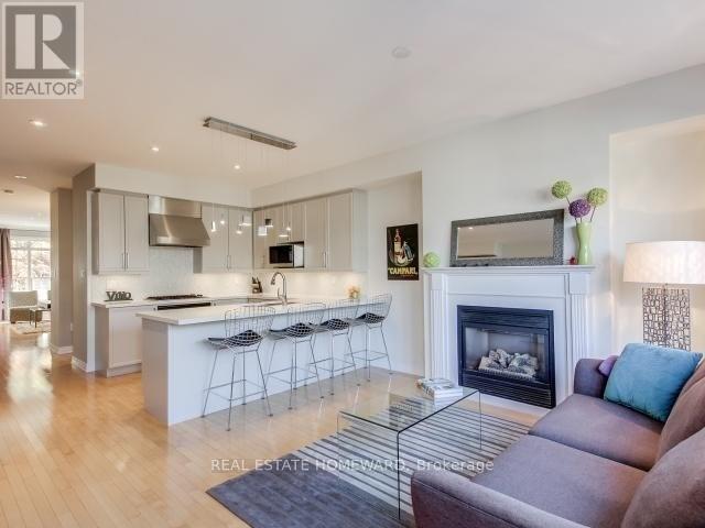 46 Joseph Duggan Road, Toronto, Ontario  M4L 3Y2 - Photo 4 - E12474517