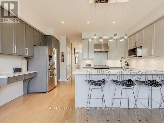46 Joseph Duggan Road, Toronto, Ontario  M4L 3Y2 - Photo 6 - E12474517