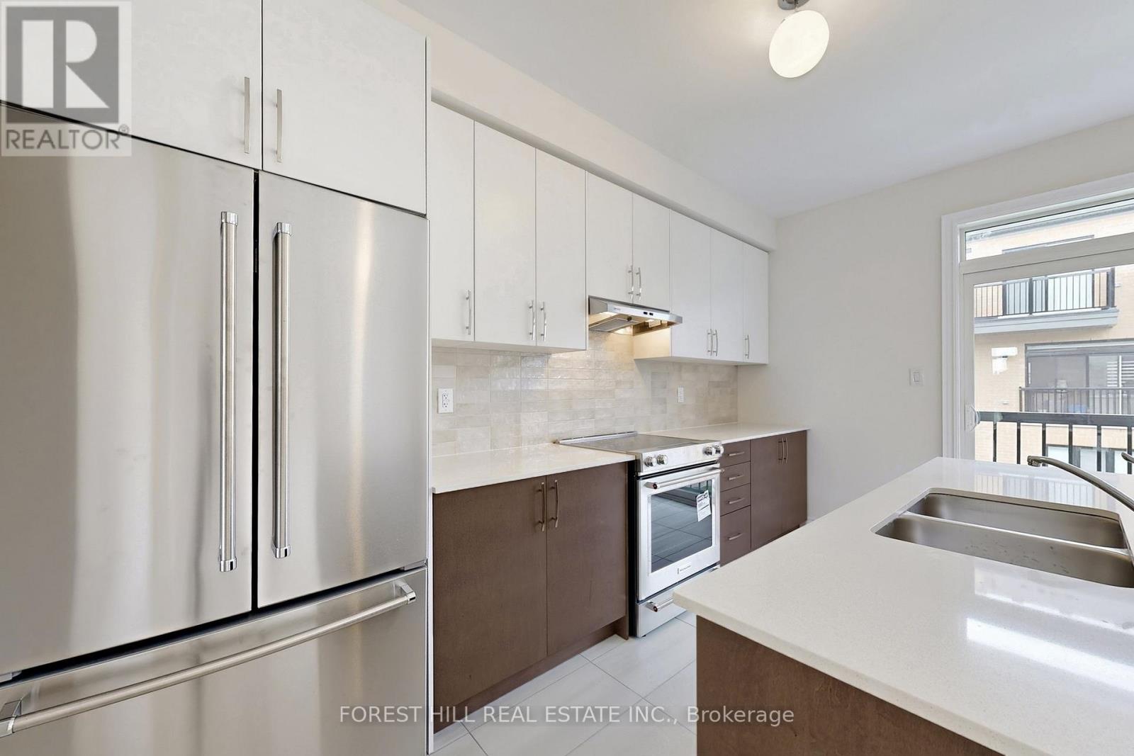 40 Tennant Circle, Vaughan, Ontario  L4H 5L5 - Photo 10 - N12474554