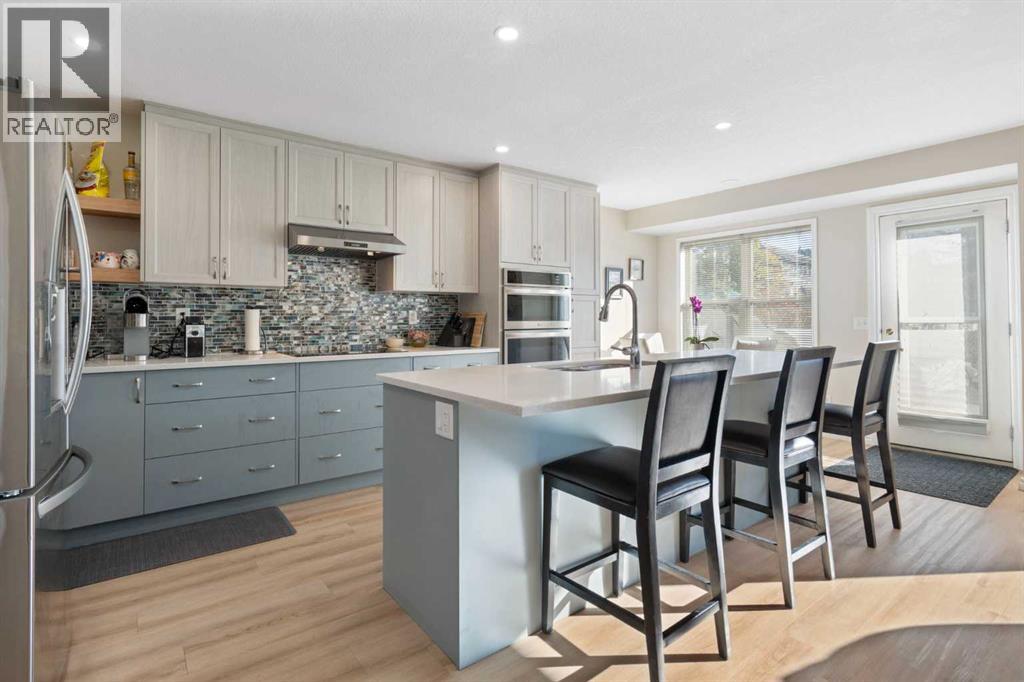 165 Harvest Park Circle Ne, Calgary, Alberta  T3K 4V3 - Photo 3 - A2265624